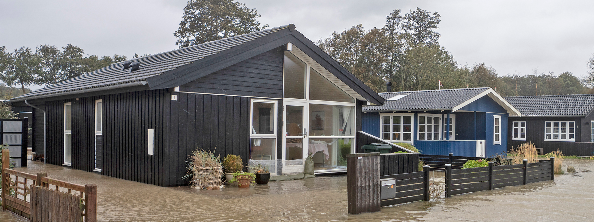 oversvømmet sommerhus