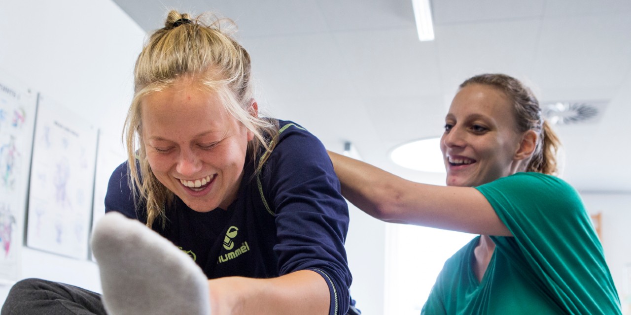 grinende studerende på sundhed og velfærd